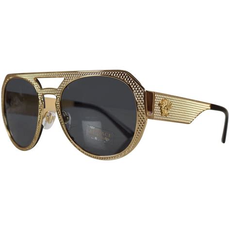 gold frame Versace shades